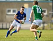 28 May 2022; Michael Quinn of Longford in action against Josh Largo Ellis of Fermanagh during the Tailteann Cup Round 1 match between Longford and Fermanagh at Glennon Brothers Pearse Park in Longford. Photo by Sam Barnes/Sportsfile