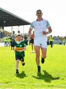 28 May 2022; Paul Geaney of Kerry and his son Paidi, aged 5, leave the field after the Munster GAA Football Senior Championship Final match between Kerry and Limerick at Fitzgerald Stadium in Killarney. Photo by Diarmuid Greene/Sportsfile