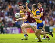 29 May 2022; Damien Comer of Galway in action against Brian Stack of Roscommon during the Connacht GAA Football Senior Championship Final match between Galway and Roscommon at Pearse Stadium in Galway. Photo by Eóin Noonan/Sportsfile
