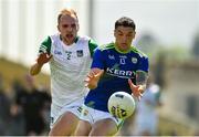 28 May 2022; Tony Brosnan of Kerry in action against Sean O'Dea of Limerick during the Munster GAA Football Senior Championship Final match between Kerry and Limerick at Fitzgerald Stadium in Killarney. Photo by Diarmuid Greene/Sportsfile