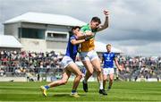 29 May 2022; Niall McNamee of Offaly claims a mark against Patrick O'Keane of Wicklow during the Tailteann Cup Round 1 match between Offaly and Wicklow at O'Connor Park in Tullamore, Offaly. Photo by Harry Murphy/Sportsfile