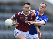 29 May 2022; Sam Duncan of Westmeath in action against Paul Kingston of Laois during the Tailteann Cup Round 1 match between Laois and Westmeath at MW Hire O'Moore Park in Portlaoise, Laois. Photo by Piaras Ó Mídheach/Sportsfile