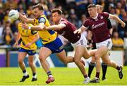 29 May 2022; Niall Daly of Roscommon is tackled by Paul Conroy of Galway during the Connacht GAA Football Senior Championship Final match between Galway and Roscommon at Pearse Stadium in Galway. Photo by Eóin Noonan/Sportsfile