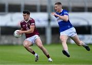 29 May 2022; David Lynch of Westmeath in action against Evan O'Carroll of Laois during the Tailteann Cup Round 1 match between Laois and Westmeath at MW Hire O'Moore Park in Portlaoise, Laois. Photo by Piaras Ó Mídheach/Sportsfile