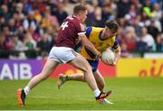 29 May 2022; Cian McKeon of Roscommon is tackled by Jack Glynn of Galway during the Connacht GAA Football Senior Championship Final match between Galway and Roscommon at Pearse Stadium in Galway. Photo by Eóin Noonan/Sportsfile