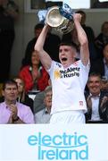 29 May 2022; Tyrone captain Eoin McElholm lifts the Fr Murray Cup after the Electric Ireland Ulster GAA Football Minor Championship Final match between Derry and Tyrone at St Tiernach's Park in Clones, Monaghan. Photo by Stephen McCarthy/Sportsfile