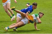 29 May 2022; Rory Egan of Offaly is tackled by Patrick O'Keane of Wicklow during the Tailteann Cup Round 1 match between Offaly and Wicklow at O'Connor Park in Tullamore, Offaly. Photo by Harry Murphy/Sportsfile