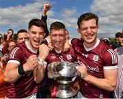 29 May 2022; Galway players, from left, Tomo Culhane, Johnny Heaney and Owen Gallagher celebrate with the cup after their side's victory in the Connacht GAA Football Senior Championship Final match between Galway and Roscommon at Pearse Stadium in Galway. Photo by Sam Barnes/Sportsfile