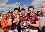 29 May 2022; Galway players, from left, Tomo Culhane, Johnny Heaney and Owen Gallagher celebrate with the cup after their side's victory in the Connacht GAA Football Senior Championship Final match between Galway and Roscommon at Pearse Stadium in Galway. Photo by Sam Barnes/Sportsfile
