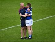 29 May 2022; Westmeath selector John Keane with Ross Munnelly of Laois after the Tailteann Cup Round 1 match between Laois and Westmeath at MW Hire O'Moore Park in Portlaoise, Laois. Photo by Piaras Ó Mídheach/Sportsfile