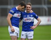 29 May 2022; Laois players John O'Loughlin, left, and Ross Munnelly after their side's defeat in the Tailteann Cup Round 1 match between Laois and Westmeath at MW Hire O'Moore Park in Portlaoise, Laois. Photo by Piaras Ó Mídheach/Sportsfile