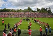 29 May 2022; Derry players runs out for the Ulster GAA Football Senior Championship Final between Derry and Donegal at St Tiernach's Park in Clones, Monaghan. Photo by Stephen McCarthy/Sportsfile