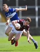 29 May 2022; Jonathan Lynam of Westmeath in action against Evan O'Carroll of Laois during the Tailteann Cup Round 1 match between Laois and Westmeath at MW Hire O'Moore Park in Portlaoise, Laois. Photo by Piaras Ó Mídheach/Sportsfile