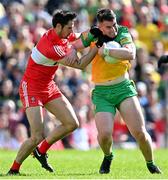 29 May 2022; Patrick McBrearty of Donegal is tackled by Christopher McKaigue of Derry during the Ulster GAA Football Senior Championship Final between Derry and Donegal at St Tiernach's Park in Clones, Monaghan. Photo by Ramsey Cardy/Sportsfile