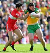 29 May 2022; Patrick McBrearty of Donegal is tackled by Christopher McKaigue of Derry during the Ulster GAA Football Senior Championship Final between Derry and Donegal at St Tiernach's Park in Clones, Monaghan. Photo by Ramsey Cardy/Sportsfile