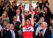 29 May 2022; Derry captain Christopher McKaigue lifts the Anglo Celt Cup after the Ulster GAA Football Senior Championship Final between Derry and Donegal at St Tiernach's Park in Clones, Monaghan. Photo by Stephen McCarthy/Sportsfile