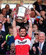 29 May 2022; Derry captain Christopher McKaigue lifts the Anglo Celt Cup after the Ulster GAA Football Senior Championship Final between Derry and Donegal at St Tiernach's Park in Clones, Monaghan. Photo by Stephen McCarthy/Sportsfile