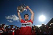 29 May 2022; Christopher McKaigue of Derry celebrates with the Anglo Celt Cup after the Ulster GAA Football Senior Championship Final between Derry and Donegal at St Tiernach's Park in Clones, Monaghan. Photo by Stephen McCarthy/Sportsfile