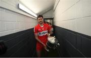 29 May 2022; Christopher McKaigue of Derry brings the Anglo Celt Cup to his team's dressing room after the Ulster GAA Football Senior Championship Final between Derry and Donegal at St Tiernach's Park in Clones, Monaghan. Photo by Stephen McCarthy/Sportsfile