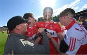 29 May 2022; Christopher McKaigue of Derry celebrates with supporters after the Ulster GAA Football Senior Championship Final between Derry and Donegal at St Tiernach's Park in Clones, Monaghan. Photo by Ramsey Cardy/Sportsfile