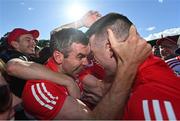 29 May 2022; Benny Heron, left, and Gareth McKinless of Derry celebrate after the Ulster GAA Football Senior Championship Final between Derry and Donegal at St Tiernach's Park in Clones, Monaghan. Photo by Ramsey Cardy/Sportsfile