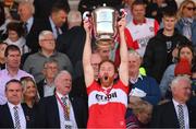 29 May 2022; Conor Glass of Derry lifts the Anglo Celt Cup after the Ulster GAA Football Senior Championship Final between Derry and Donegal at St Tiernach's Park in Clones, Monaghan. Photo by Stephen McCarthy/Sportsfile