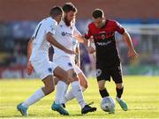 27 May 2022; Liam Burt of Bohemians in action against Gary Deegan and Luke Heeney of Drogheda United during the SSE Airtricity League Premier Division match between Bohemians and Drogheda United at Dalymount Park in Dublin. Photo by Michael P Ryan/Sportsfile