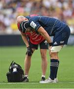 28 May 2022; Caelan Doris of Leinster is treated for an injury by Leinster head physiotherapist Garreth Farrell during the Heineken Champions Cup Final match between Leinster and La Rochelle at Stade Velodrome in Marseille, France. Photo by Ramsey Cardy/Sportsfile