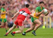 29 May 2022; Michael Langan of Donegal in action against Padraig McGrogan of Derry during the Ulster GAA Football Senior Championship Final between Derry and Donegal at St Tiernach's Park in Clones, Monaghan. Photo by Stephen McCarthy/Sportsfile