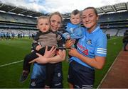 28 May 2022; Dublin goalkeeper Ciara Trant, with Patrick, and Niamh Hetherton, with nephew CJ, right, after the Leinster LGFA Senior Football Championship Final match between Meath and Dublin at Croke Park in Dublin. Photo by Stephen McCarthy/Sportsfile
