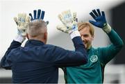 30 May 2022; Goalkeeper Caoimhin Kelleher with goalkeeping coach Dean Kiely, left, during a Republic of Ireland training session at the FAI National Training Centre in Abbotstown, Dublin. Photo by Stephen McCarthy/Sportsfile