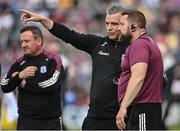 29 May 2022; Galway manager Padraic Joyce, centre, in conversation with coach Cian O'Neill during the Connacht GAA Football Senior Championship Final match between Galway and Roscommon at Pearse Stadium in Galway. Photo by Sam Barnes/Sportsfile