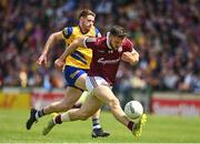 29 May 2022; Damien Comer of Galway in action against Eddie Nolan of Roscommon during the Connacht GAA Football Senior Championship Final match between Galway and Roscommon at Pearse Stadium in Galway. Photo by Sam Barnes/Sportsfile