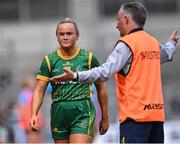 28 May 2022; Vikki Wall of Meath leaves the pitch after she was shown a yellow card by referee Jonathan Murphy, as her manager Eamonn Murray looks on, during the Leinster LGFA Senior Football Championship Final match beween Meath and Dublin at Croke Park in Dublin. Photo by Piaras Ó Mídheach/Sportsfile