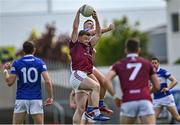 29 May 2022; Ger Egan of Westmeath wins possession ahead of Patrick O'Sullivan of Laois during the Tailteann Cup Round 1 match between Laois and Westmeath at MW Hire O'Moore Park in Portlaoise, Laois. Photo by Piaras Ó Mídheach/Sportsfile