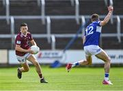 29 May 2022; Ronan O'Toole of Westmeath in action against Kevin Swayne of Laois during the Tailteann Cup Round 1 match between Laois and Westmeath at MW Hire O'Moore Park in Portlaoise, Laois. Photo by Piaras Ó Mídheach/Sportsfile