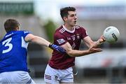 29 May 2022; Sam McCartan of Westmeath in action against Mark Timmons of Laois during the Tailteann Cup Round 1 match between Laois and Westmeath at MW Hire O'Moore Park in Portlaoise, Laois. Photo by Piaras Ó Mídheach/Sportsfile