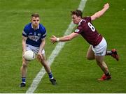 29 May 2022; Ross Munnelly of Laois in action against Jonathan Lynam of Westmeath during the Tailteann Cup Round 1 match between Laois and Westmeath at MW Hire O'Moore Park in Portlaoise, Laois. Photo by Piaras Ó Mídheach/Sportsfile