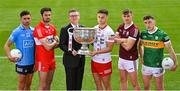 31 May 2022; Michael McKernan of All-Ireland Champions Tyrone and Ard Stiúrthóir of the GAA Tom Ryan with the Sam Maguire Cup and footballers, from left, Niall Scully of Dublin, Christopher McKaigue of Derry, Shane Walsh of Galway and Paudie Clifford of Kerry during the launch of the GAA Football All Ireland Senior Championship Series in Dublin. Photo by Brendan Moran/Sportsfile
