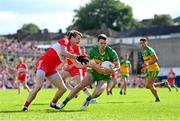 29 May 2022; Eoghan Ban Gallagher of Donegal in action against Brendan Rogers of Derry during the Ulster GAA Football Senior Championship Final between Derry and Donegal at St Tiernach's Park in Clones, Monaghan. Photo by Ramsey Cardy/Sportsfile