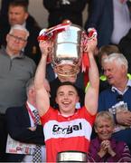 29 May 2022; Niall Toner of Derry lifts the Anglo Celt Cup after the Ulster GAA Football Senior Championship Final between Derry and Donegal at St Tiernach's Park in Clones, Monaghan. Photo by Stephen McCarthy/Sportsfile