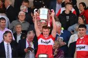 29 May 2022; Declan Cassidy of Derry lifts the Anglo Celt Cup after the Ulster GAA Football Senior Championship Final between Derry and Donegal at St Tiernach's Park in Clones, Monaghan. Photo by Stephen McCarthy/Sportsfile