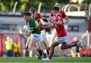 1 June 2022; Paddy Lane of Kerry in action against Alan O’Connell of Cork and Darragh O’Donovan of Cork during the Electric Ireland Munster GAA Minor Football Championship Final match between Kerry and Cork at Páirc Uí Rinn in Cork. Photo by George Tewkesbury/Sportsfile