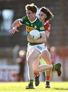 1 June 2022; Liam Evans of Kerry in action against Olan O’Donovan of Cork during the Electric Ireland Munster GAA Minor Football Championship Final match between Kerry and Cork at Páirc Uí Rinn in Cork. Photo by Piaras Ó Mídheach/Sportsfile