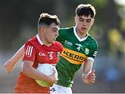 1 June 2022; Darragh O’Donovan of Cork in action against Jake Foley of Kerry during the Electric Ireland Munster GAA Minor Football Championship Final match between Kerry and Cork at Páirc Uí Rinn in Cork. Photo by Piaras Ó Mídheach/Sportsfile