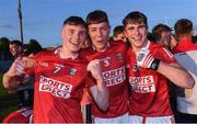 1 June 2022; Cork players, from left, Aaron Cullinane, Colin Molloy, and Ben O’Sullivan celebrate after their side's victory in the Electric Ireland Munster GAA Minor Football Championship Final match between Kerry and Cork at Páirc Uí Rinn in Cork. Photo by Piaras Ó Mídheach/Sportsfile