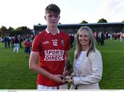 1 June 2022; Debbie Duggan of Electric Ireland presents Alan O’Connell of Cork with his Electric Ireland Best & Fairest Award after the Electric Ireland Munster GAA Minor Football Championship Final match between Kerry and Cork at Páirc Uí Rinn in Cork. Photo by Piaras Ó Mídheach/Sportsfile