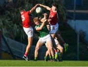 1 June 2022; Jack Clifford of Kerry in action against Colin Molloy, left, Colm Geary of Cork during the Electric Ireland Munster GAA Minor Football Championship Final match between Kerry and Cork at Páirc Uí Rinn in Cork. Photo by George Tewkesbury/Sportsfile