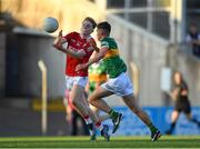1 June 2022; Gearoid Kearney of Cork in action against Maidhcí Lynch of Kerry during the Electric Ireland Munster GAA Minor Football Championship Final match between Kerry and Cork at Páirc Uí Rinn in Cork. Photo by George Tewkesbury/Sportsfile