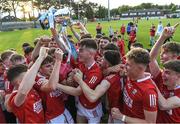 1 June 2022; Cork captain Colm Gillespie celebrates with teammates after their side's victory in the Electric Ireland Munster GAA Minor Football Championship Final match between Kerry and Cork at Páirc Uí Rinn in Cork. Photo by George Tewkesbury/Sportsfile